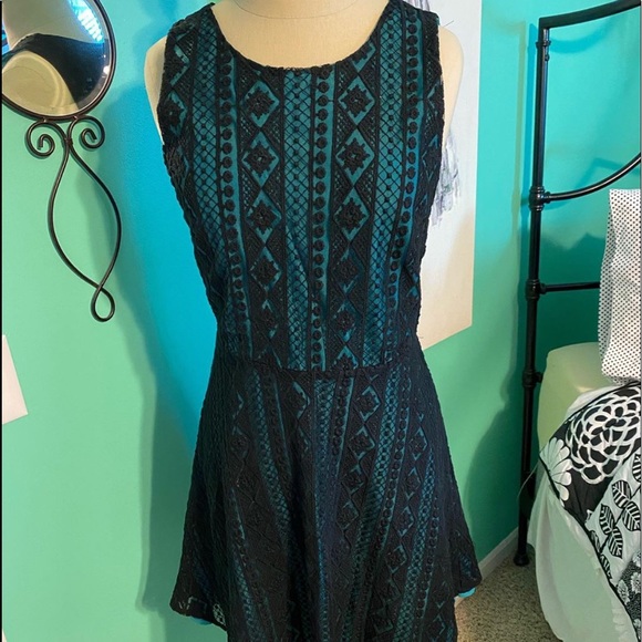 emerald green and black dress